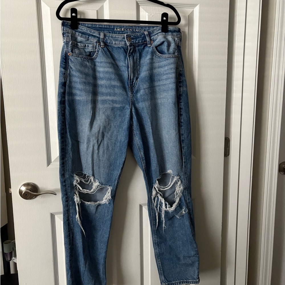 AE medium blue distressed Strigid Mom Jeans